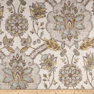 May include: A beige fabric with a floral pattern in shades of brown, blue, and purple. The pattern features intricate paisley designs and delicate floral motifs.