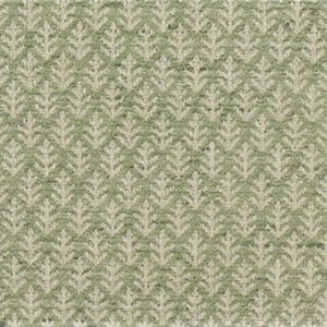 May include: A close-up of a textured fabric with a repeating pattern of stylized, light green leaves on a darker green background. The leaves are arranged in vertical rows, creating a dense, all-over design. The fabric has a slightly mottled appearance.