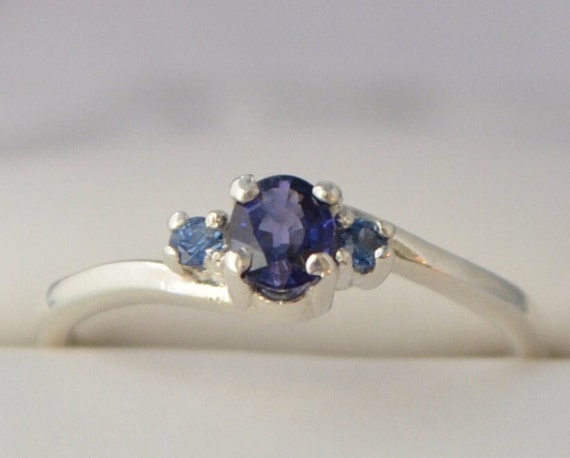 Sapphire Ring- 0.37 ct. Dark Bluish Purple with 2 blue sapphire accents