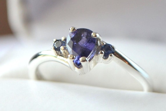 Pear Cut Purple Sapphire Ring with Blue Sapphire Accents