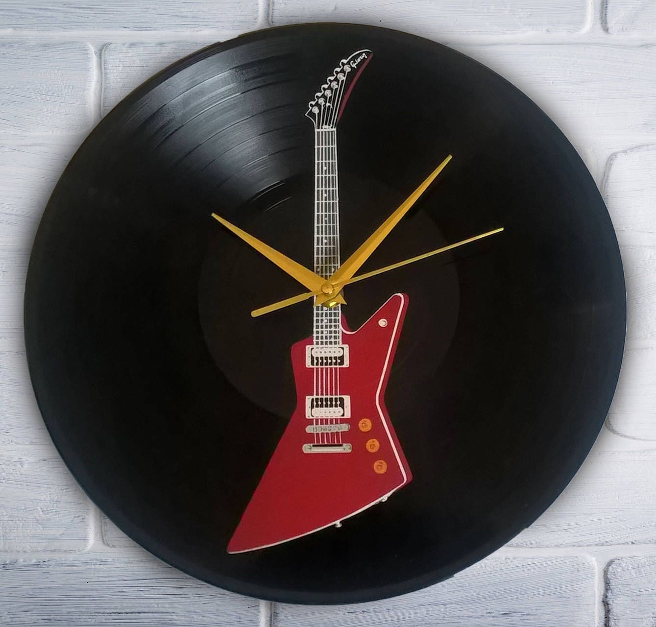 Electric guitar painted vinyl record clock.