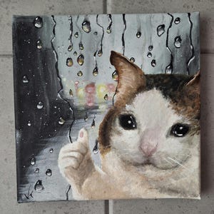 Triste meme chat qui pleure le pouce levé. Peinture acrylique sur toile