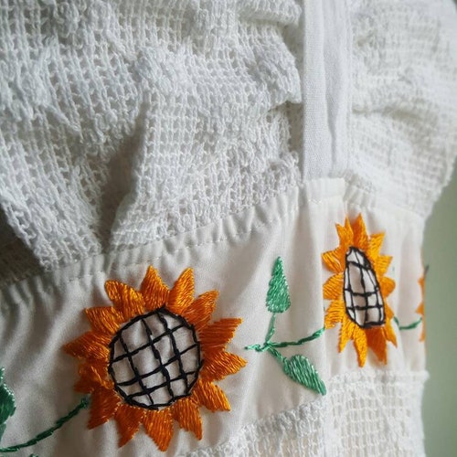 Vintage 1970s white gauzy cotton and embroidered sunflower halter dress, openwork lace bodice, ultra full skirt, handkerchief hem, shops M/L