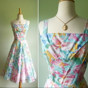 Beautiful vintage 1980s does 1950s fit and flare floral dress, light pastel blue, pink, green, yellow, tropical print, straps