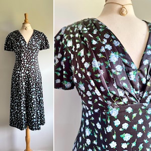 Vintage 1930s 1940s look Betsey Johnson floral dress, shiny black satin with blue floral, fit and flare draped bodice puff sleeves, size 6