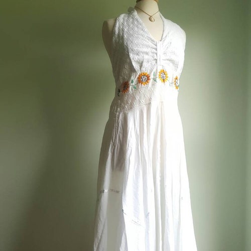 Vintage 1970s white gauzy cotton and embroidered sunflower halter dress, openwork lace bodice, ultra full skirt, handkerchief hem, shops M/L