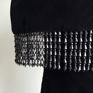 Vintage 1980s does 1920s 1930s black silky velvet deco beaded dress, off shoulder, beaded fringe shawl neck and hem, flapper look, party image 4