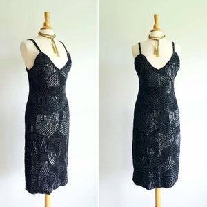 Vintage 1990s does 1930s heavily beaded black silk party dress, formal sequin gown, plunging V neckline, straps