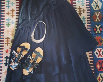 Vintage 1990s bohemian black leather, chiffon maxi skirt; trumpet, mermaid style diagonal fit / flare, gauzy layers, waist 23
