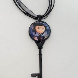 Handmade Horror Cartoon inspired Black Key Necklace Gothic and Unique Movie Memorabilia two versions available cartoon girl