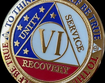 May include: Gold coin with a white triangle and the number VI in the center. The triangle is divided into three sections, each with a different color: blue, white, and red. The blue section has the word "UNITY" and stars. The white section has the word "SERVICE". The red section has the word "RECOVERY". The coin has the text "SELF BE TRUE TO THINE OWN SELF BE TRUE TO THINE OWN" around the edge.