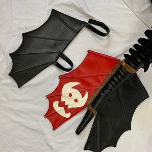 Toothless tail. How to train your dragon. Black AND red fins. Dragon tail.