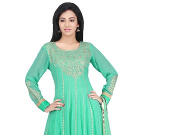 May include: A long, flowing green dress with gold embroidery and a matching dupatta. The dress has a round neckline and long sleeves.
