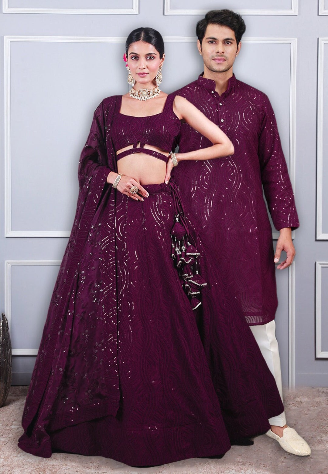 sachin and babi light blue dress Indian couple posing with their engagement outfits