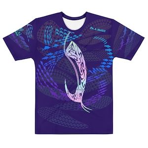 May include: Purple short-sleeved t-shirt with a colorful fish hook design and the text "PA A MAUI" on the front. The design features a school of fish, a hook, and a traditional Hawaiian pattern.