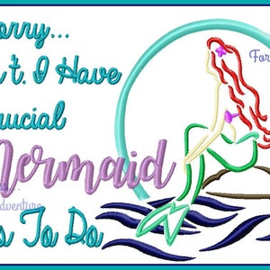 May include: A turquoise and purple embroidered design with the text "Sorry... I Can't. I Have Crucial Mermaid Things To Do" and a cartoon mermaid with red hair sitting on a rock in a turquoise circle.