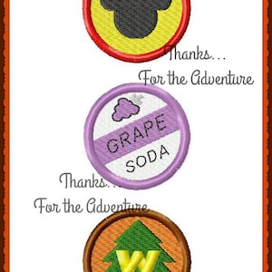 May include: Three round, colorful, embroidered patches with text. The top patch is red and yellow with a black Mickey Mouse head. The middle patch is purple and white with the text "Grape Soda". The bottom patch is brown and orange with a green pine tree and the letter "W" inside.