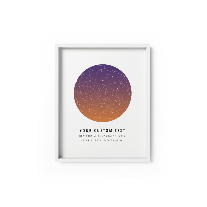 May include: A framed print with a circular star map in shades of orange and purple. The map shows the constellations visible in the night sky over New York City on January 1, 2018. The text below the map reads "YOUR CUSTOM TEXT", "NEW YORK CITY | JANUARY 1, 2018", and "40&deg;42'51.37"N, 74&deg;0'21.49"W."