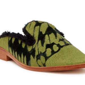 May include: Green velvet mule with a black butterfly pattern and a wooden heel.