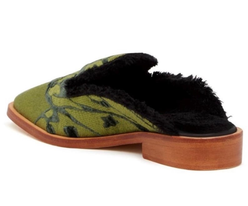 May include: Green and black patterned mule with a faux fur lining and a wooden heel.