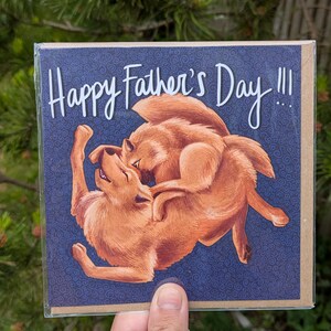 Tarjeta del Día del Padre con el lobo y el cachorro