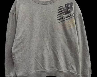 Vintage 90s Vintage New Balance Sudadera gran logo hechizo out jumper