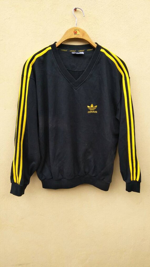 black and yellow adidas sweatshirt