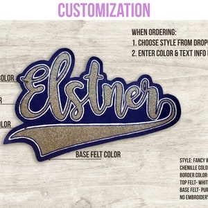 May include: Customizable patch with the name "Elstner" in gold glitter chenille on a navy blue background. The patch has a white top felt, purple border and base felt, and a fancy tail design. Instructions for ordering are included.