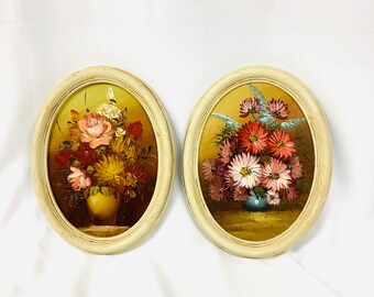 Deux peintures à l'huile originales de petites fleurs vintage dans un cadre ovale