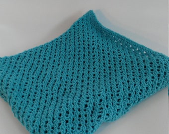 Soft baby blanket hand knit in turquoise blue easy care yarn