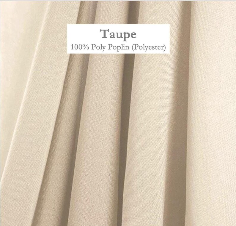 a close-up view of a fabric with a light beige color.