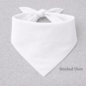 A white bandana tied into a bow, with the text "Stitched Hem" below it.