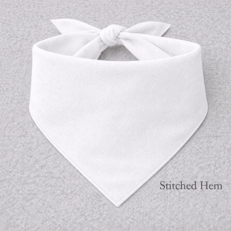 A white bandana tied into a bow, with the text "Stitched Hem" below it.