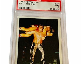 PRO WRESTLING CARD 1985 Topps Wwf Graded Psa Mint 9 wwe nwa awa superstars ringside action #26 Brutus Beefcake Up in Air #26