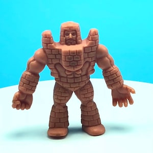 1985 VINTAGE M.U.S.C.L.E. muscle man men wrestling wrestler action figure Mattel anime flesh color toy #42 Goremuman building man wall brick