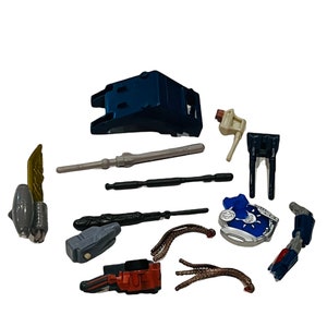 Lote de armas y piezas de Transformers, accesorios, figuras de juguete Vtg Gobots Hasbro Prime BMC2