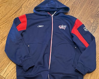Columbus Blue Jackets hoodiejack met rits mediumblauw M jas Reebok NHL Hockey Red