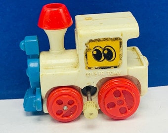 WIND UP TOY vintage collectible walking moving 1978 Tomy train locomotive engine red white blue singapore