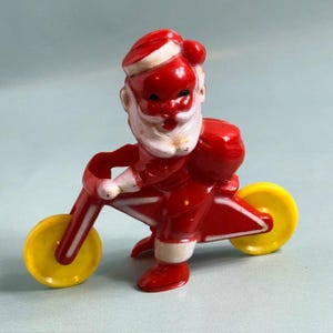 Antike Weihnachtsmannfigur aus Bakelit und Kunststoff, Motorradfigur, Vintage B4