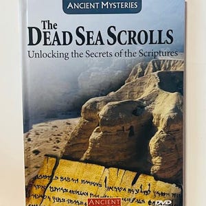 May include: A book cover with a brown and tan landscape image. The title is "The Dead Sea Scrolls: Unlocking the Secrets of the Scriptures". The book is part of the "Ancient Mysteries" and "Ancient Civilizations" series.