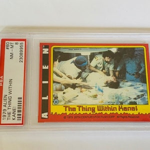 Alien Trading Card Ripley 1979 Topps Thing inside Kane facehugger PSA 8 Mint graded ZELDZAME 20e-eeuwse sciencefiction