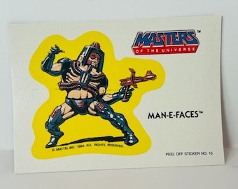 Pegatina de tarjeta coleccionable de Masters of Universe de 1984, rompecabezas de Mattel, He-Man, Man-E-Faces