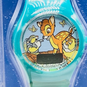 WALT DISNEY WATCH vintage Disneyland world wristwatch collectible japan factory sealed case vtg Bambi Thumper Flower butterflies green