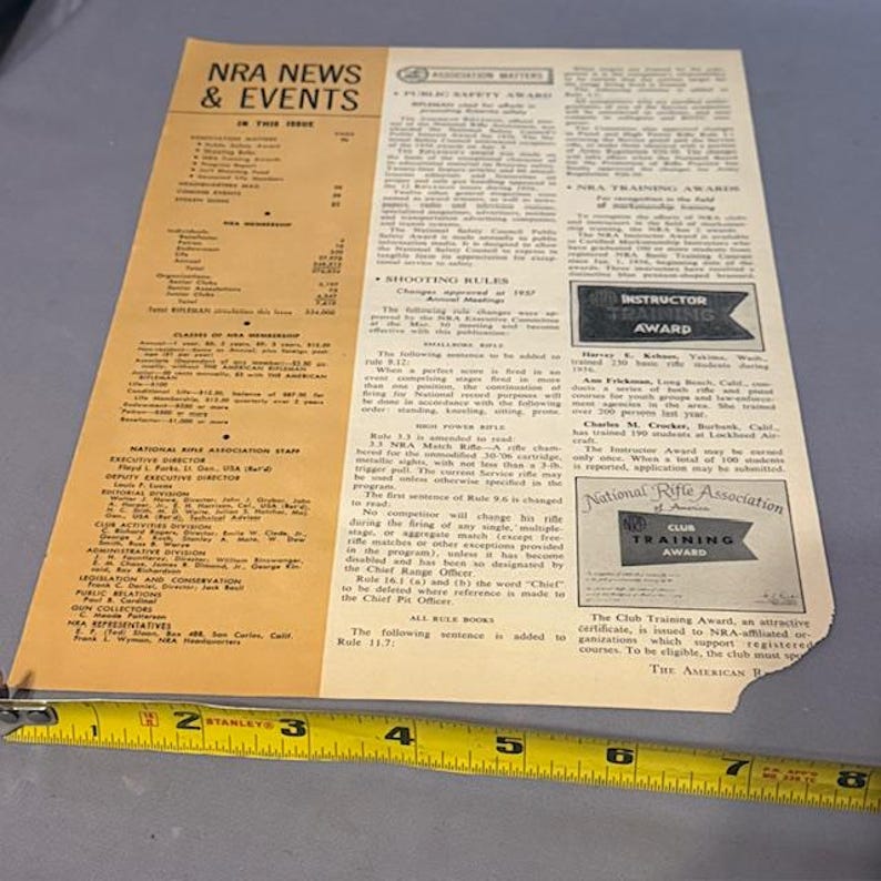 May include: A vintage NRA News & Events publication, featuring articles and announcements. The document includes text and logos for the National Rifle Association, with an Instructor Training Award and Club Training Award.
