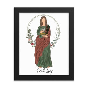 May include: A digital illustration of Saint Lucy, a Christian saint, depicted in a green and red robe with a wreath of flowers and leaves behind her. The text "Saint Lucy" is written below the image.