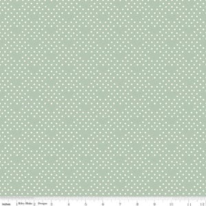 May include: A seamless fabric pattern featuring small white polka dots on a soft, muted green background. The dots are evenly spaced, creating a classic and versatile design. The fabric is measured in inches.