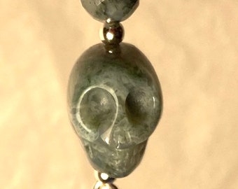 A Bit of Company - pendant - moss agate - sterling silver - carved skull bead