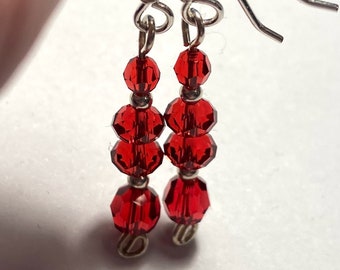 Not Quite Feral - earrings - Swarovski crystal - sterling silver - red or something right next to it