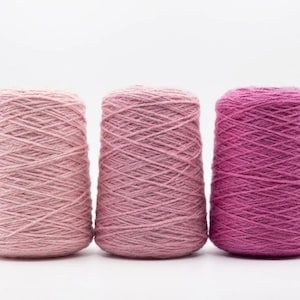 3 pink shade tufting yarns in a white area