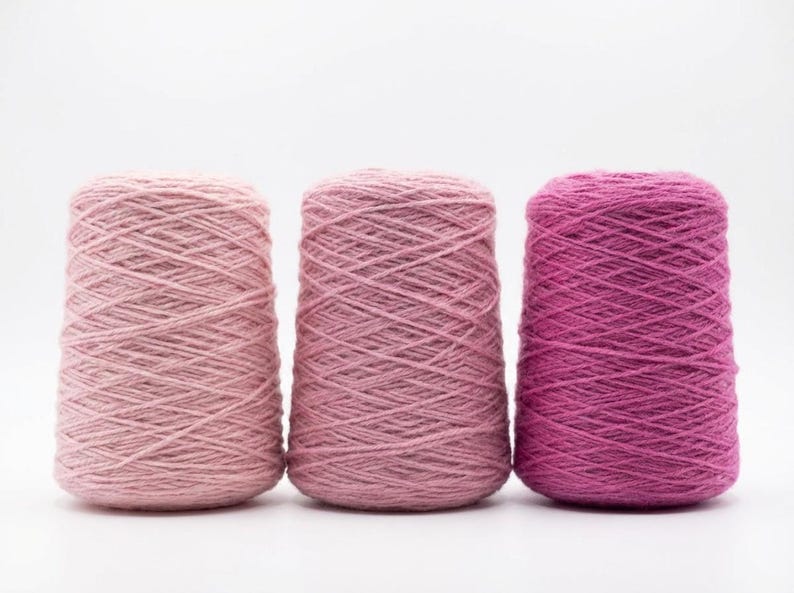 3 pink shade tufting yarns in a white area